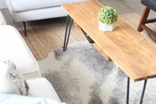 16 a cool and functional hairpin leg coffee table with an additional hidden shelf is a perfect solution for a boho or mid-century modern space