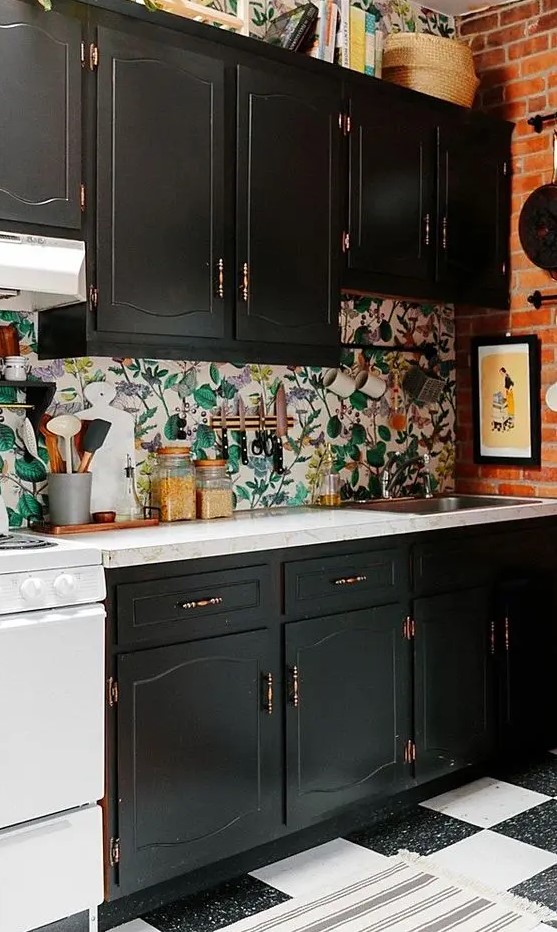 such a bold wallpaper backsplash is a great idea to add color to a monochromatic kitchen
