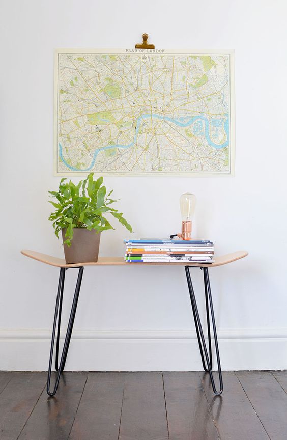 a creative console table of a skateboard and hairpin legs is a lovely way to upcycle a thing, it looks cool and bold