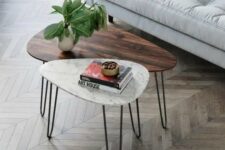 21 a duo of mid-century modern coffee tables, with a rich-stained wood and white stone tabletops and hairpin legs is cool