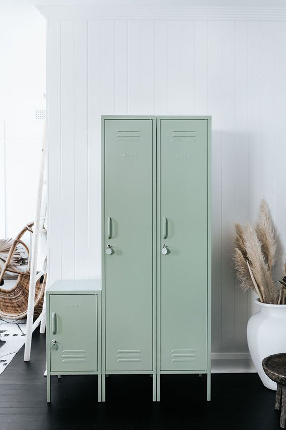 a set of light green skinny lockers is a lovely idea for a Scandinavian space, it's a delicate touch of color
