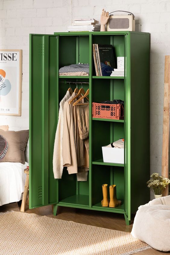 a cool two-door metal locker in green is a stylish and cool addition to a bedroom, it's a soft color and a functional piece