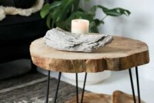 34 a rustic side table of a tree slice and black hairpin legs is a lovely rustic piece or a plant stand if you need one