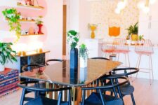 36 a white kitchen with flat panel cabinets, tall pink stools, floral wallpaper, a dining zone with elegant mid-century modern furniture