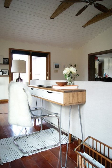 a slim mid-century modern desk of an IKEA Alex Ekby shelf, with a wooden cover and hairpin legs will fit a tiny space