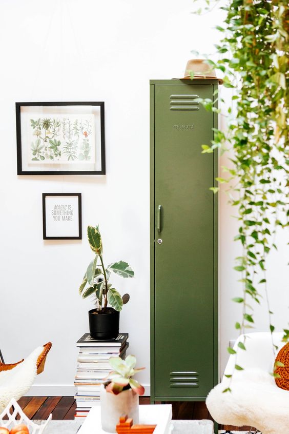 a single green locker placed in a living room doesn't look too bold, bulky or rough, thanks to its soft color