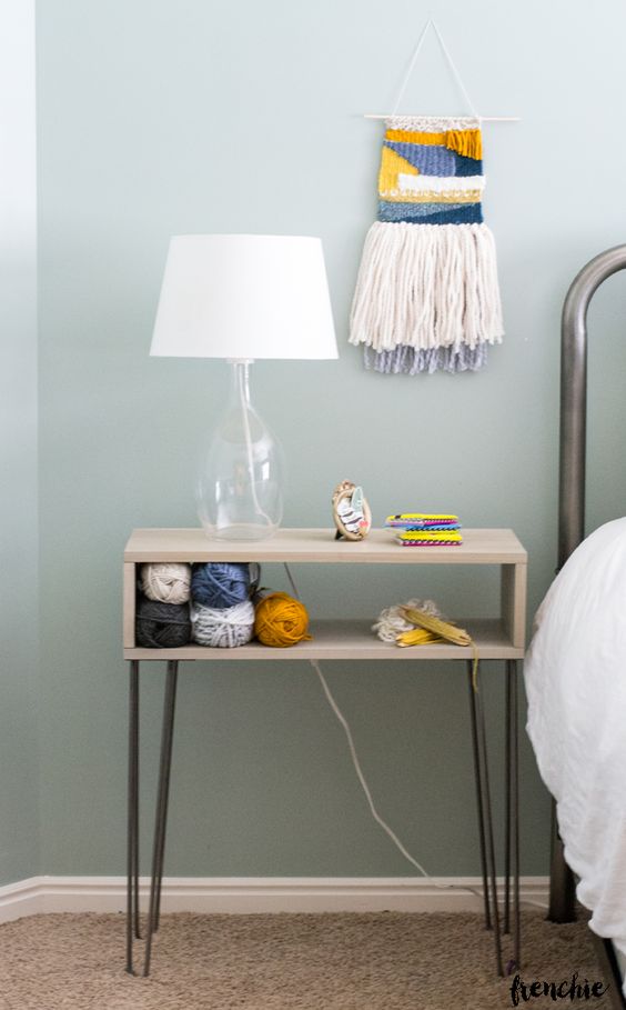 a small and cool whitewashed nightstand on hairpin legs is a cool idea for a mid-century modern or boho bedroom