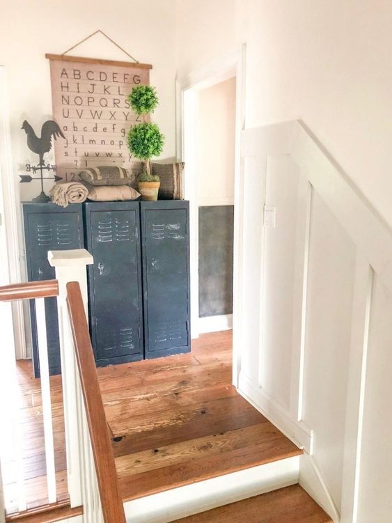 an awkward nook with chalkboard lockers, some pillows, a sign, greenery and decor is a lovely idea for a farmhouse space