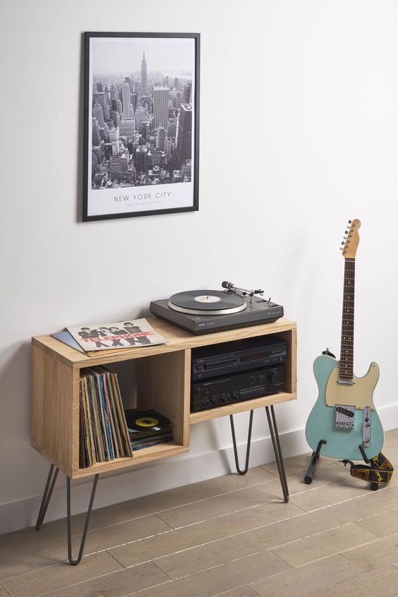 a stylish asymmetrical music console with black hairpin legs is a cool and stylish idea if you love music and vinyl