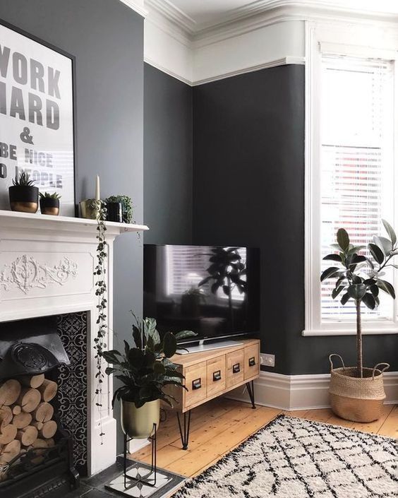 a vintage-inspired TV unit with drawers and hairpin legs is a stylish idea for both a vintage and a modern space