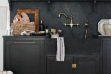 a moody kitchen with shaker style cabinets