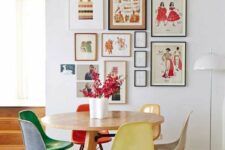 a lovely dining space with a bold gallery wall