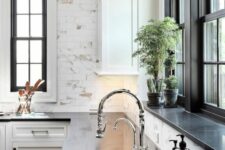 a stylish black and white kitchen design