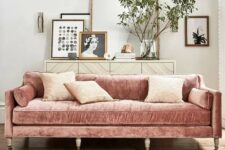 a dusty pink velvet sofa will enliven a neutral living room and make it look softer and cuter
