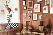 a boho living room with a gallery wall