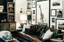 a living room with a striking floor to ceiling gallery wall