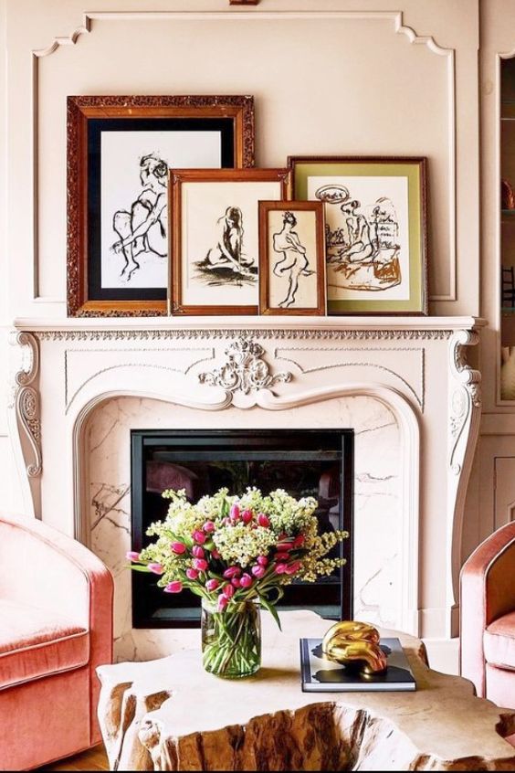 a modern and luxurious French fireplace with an arrangement of artwork on the mantel will add chic to any space