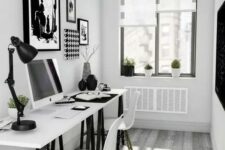 a small Scandinavian home office with a two black and white trestle desks, white Eames chairs and black and white artworks