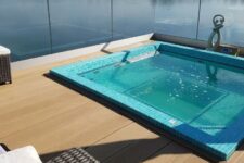 a stylish small deck with a pool