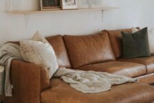 a stylish corner brown leather sofa with various pillows will become a staple of your living room