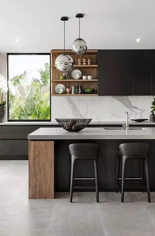 a super refined contemporary kitchen with sleek black cabinets, stained wood elements, white stone coutnertops and a backsplash