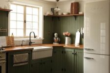 a cozy kitchen design with fluted cabinets