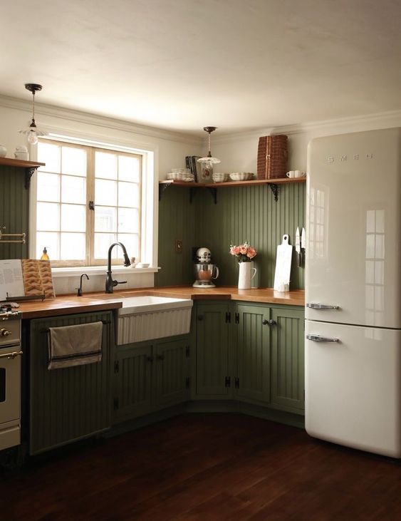 Green Wooden Kitchen Interior With Wooden Shelf And Cozy