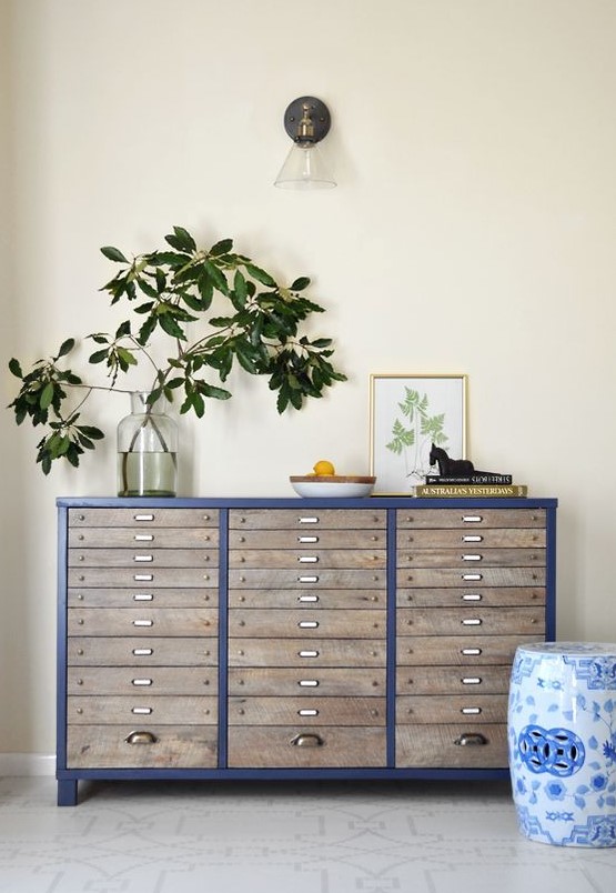 a renovated navy file cabinet with some lovely decor is a cool way to upcycle a piece and make your space cooler