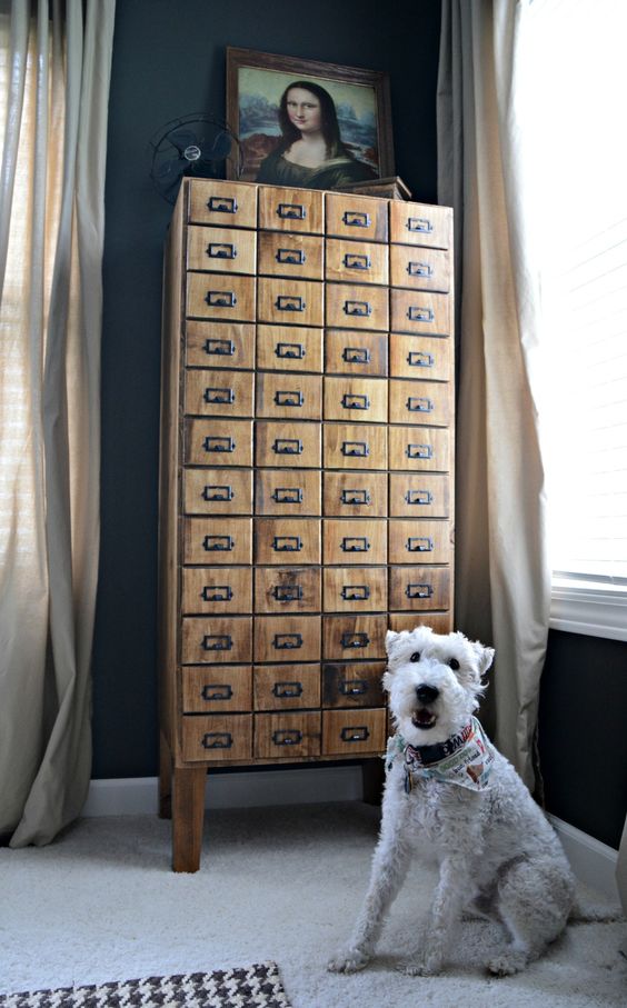 a vintage light-stained card cabinet is a stylish addiiton to any room, especially a home office, it will bring vintage elegance