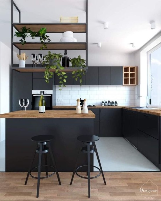 https://www.digsdigs.com/photos/2023/05/26-a-contemporary-black-kitchen-with-butcherblock-countertops-a-suspended-shelf-over-the-kitchen-island-and-a-white-tile-backsplash.jpg