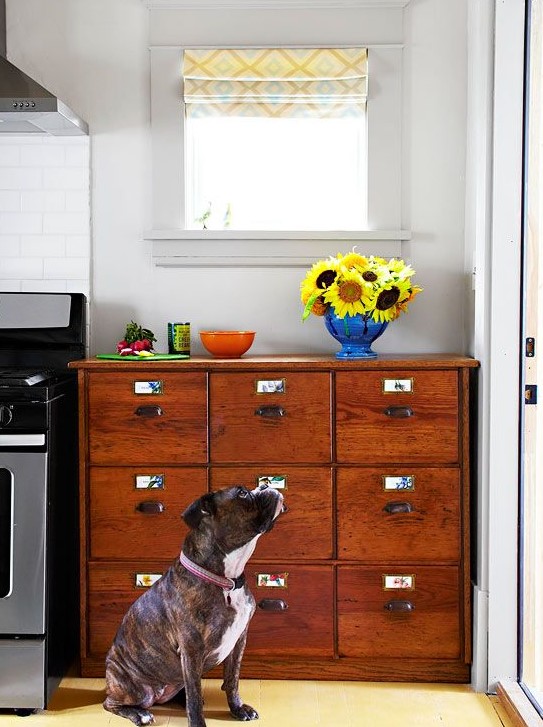 a vintage stained card cabinet turned into a kitchen storage unit is a cool and creative way to upcycle an old unit