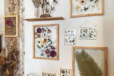 a whole gallery wall with bold pressed blooms in light-stained and gilded frames is amazing for any space