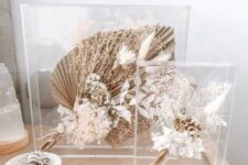 dried leaves, blooms and fronds in acryl are amazing boho home decoations, they look floating in the air