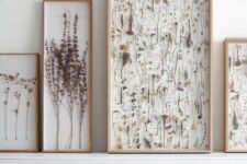 pressed flowers, leaves and blooming branches in light-stained frame can form a whole gallery wall