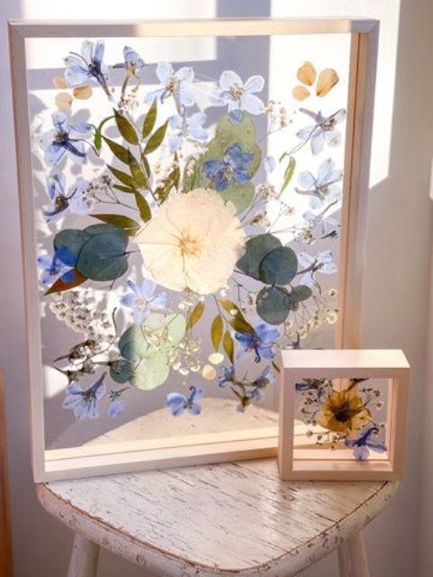 pressed flowers, leaves and blooms in light-stained frames will be a nice decor idea for any summer or spring space