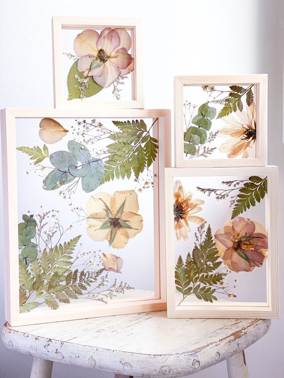 pressed flowers, leaves and foliage in light stained frames will be a great rustic or boho home decor idea