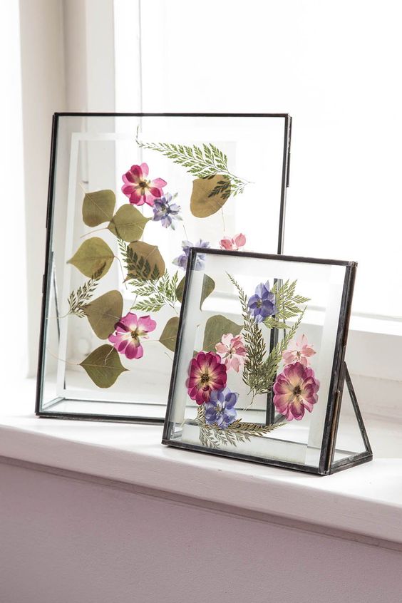 super bright blooms and leaves in black frames can be comfortably placed on windowsills, shelves and mantels
