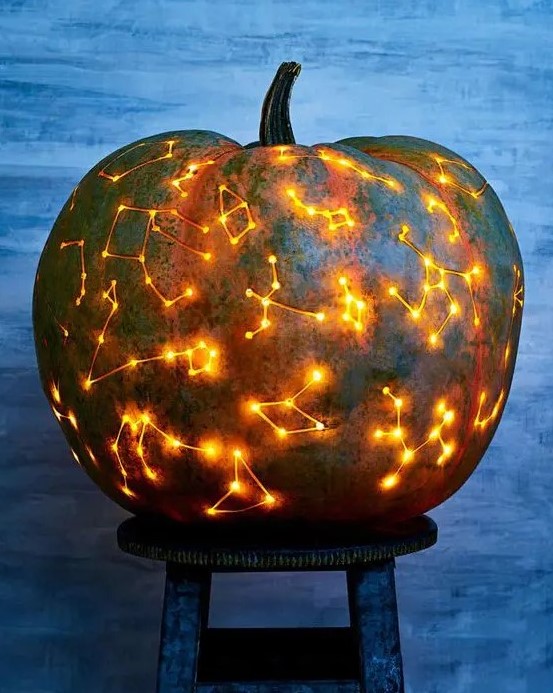 a dreamy and beautiful constellation pumpkin is ideal for Halloween and will look fantastic in the fall on the whole