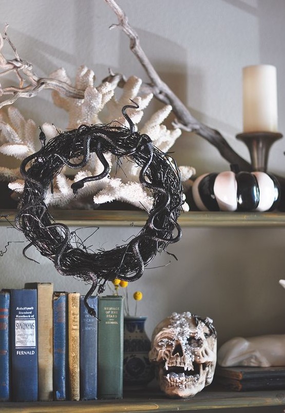 a vine and black snake Halloween wreath is a timeless and cool decoration for this spooky holiday