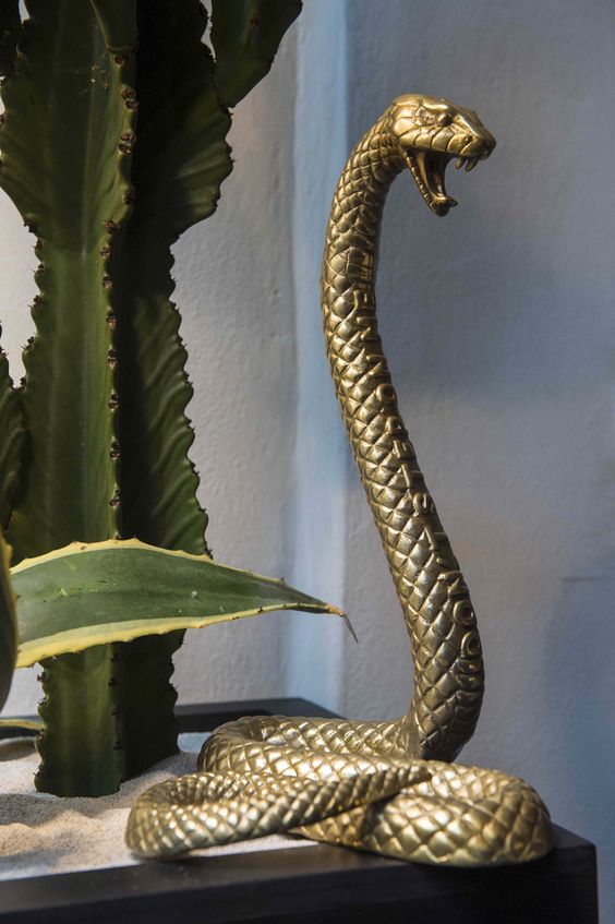 a gold resin snake is a nice decoration for Halloween, you can make one yourself easily