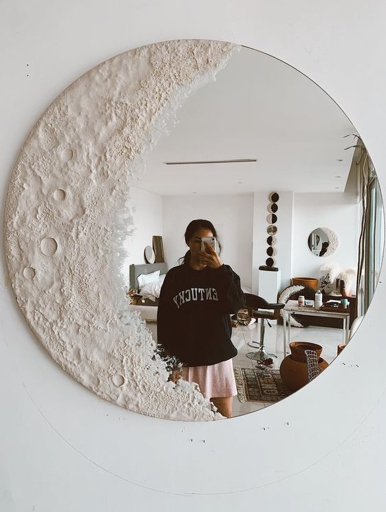 a romantic white moon mirror is a gorgeous decoration for any space, and it will bring a celestial feel to the space