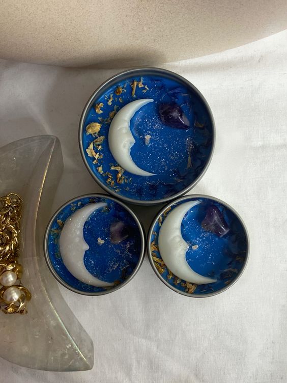 beautiful blue moon candles with gold touches and crystals are amazing to illuminate your Halloween party