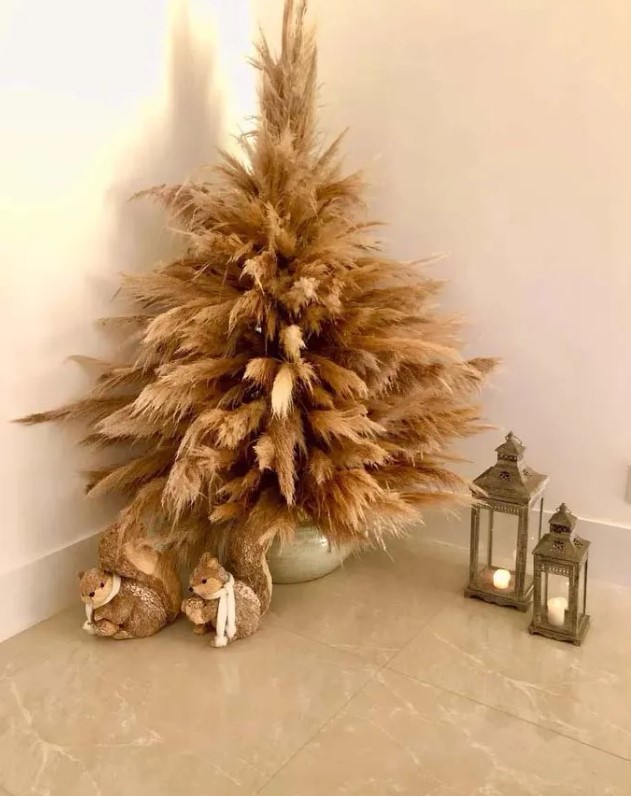 a mini pampas grass Christmas tree n a pot and non-decorated is a lovely decoration for an awkward nook or if you don't have much space
