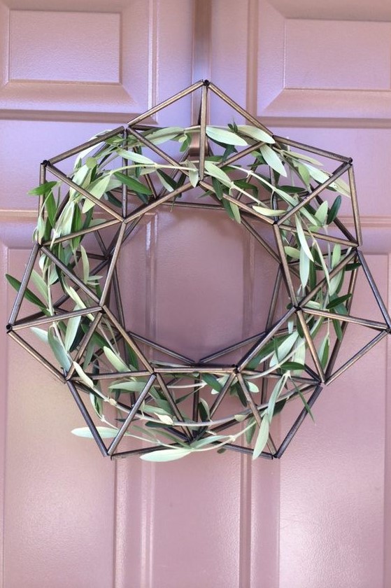 a modern himmeli Christmas wreath with olive branches is a lovely idea for a modern Christmas porch