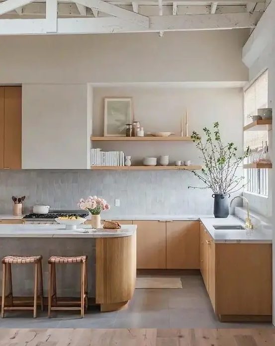 an airy contemporary kitchen with stained cabinets and a kitchen island, open shelves, a grey zellige tile backsplash
