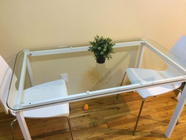 Melltorp hack with a glass tabletop