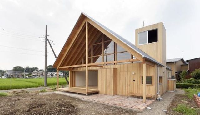 traditional Japanese house with a gable roof and interesting framing