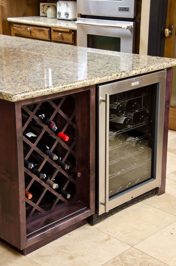 kitchen island with a wine cellar