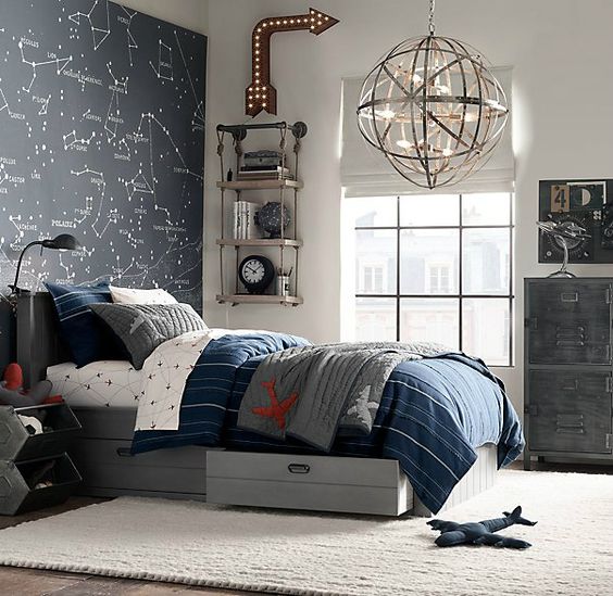 navy and grey bedding with a plane print