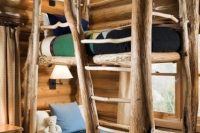 a rough wood kid bed that reminds of a mountain chalet